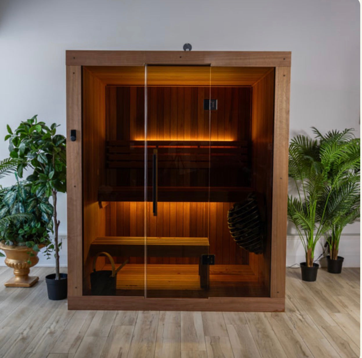 LeisureCraft CT Element Loft Indoor Sauna with wooden interior, benches, and control panel for home relaxation.