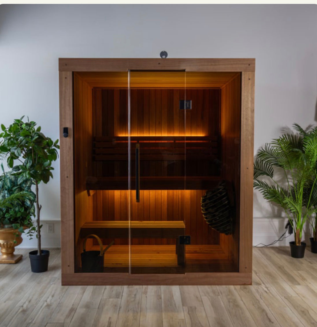 LeisureCraft CT Element Studio Indoor Sauna with wooden interior and glass door, designed for home relaxation and wellness.