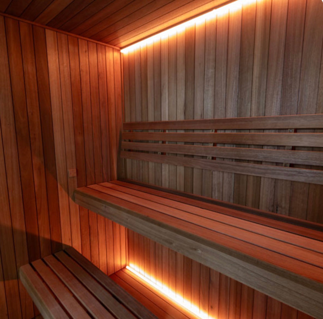 LeisureCraft CT Element Studio Indoor Sauna with wooden interior and glass door, designed for home wellness and relaxation.