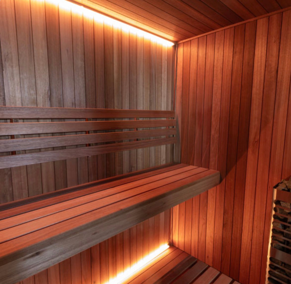 LeisureCraft CT Element Studio Indoor Sauna shown with wooden interior and glass door, designed for home relaxation.